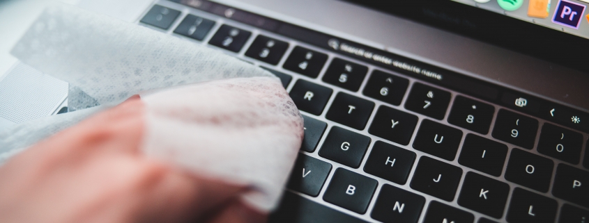 cleaning computer keyboard for wellness
